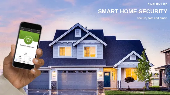 Smart home security app on a phone in front of a house